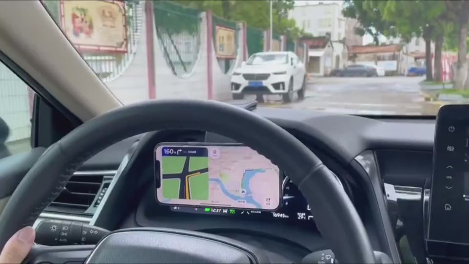 GEARRIVE magnetic car phone mount in use while driving with phone navigation displayed on the dashboard